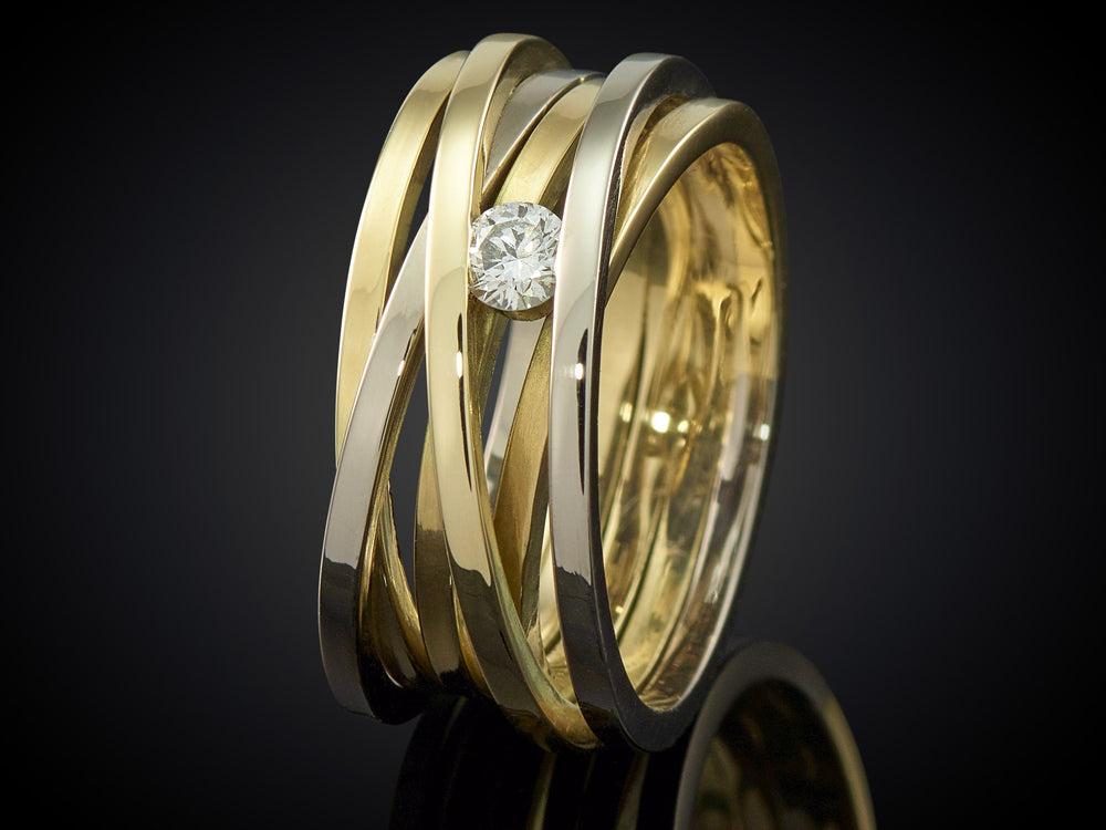 Verwikkeling | 6-baans bi-color gouden ring met 0.15crt TWVVS diamant
