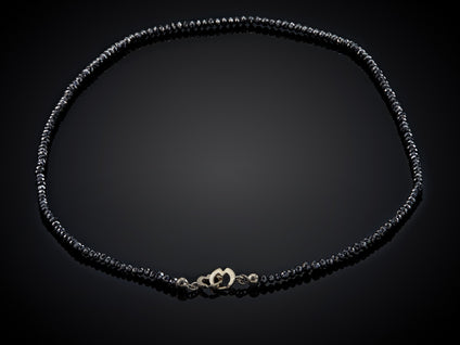 Oogappel | zwart diamant collier met schuifslot in 14 karaat witgoud
